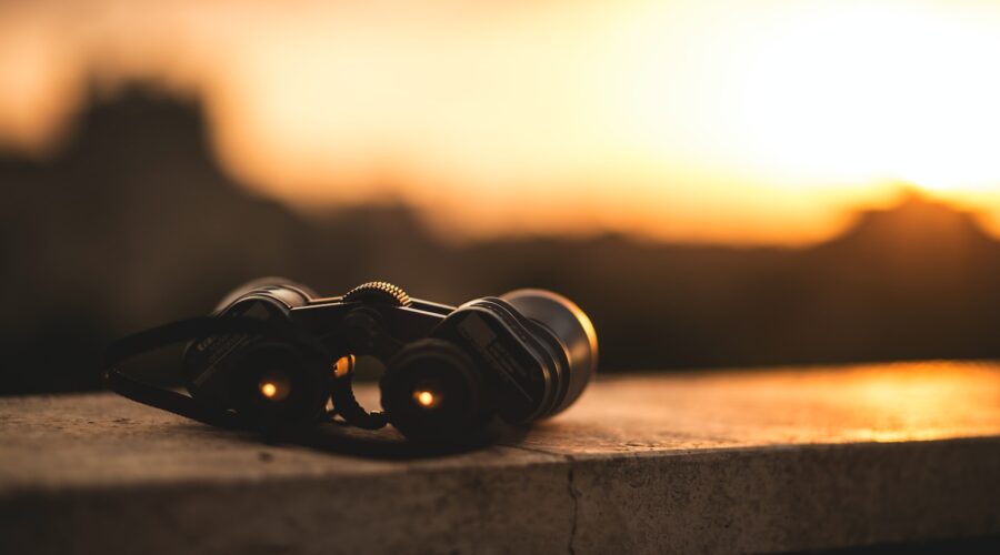 close-up selective focus photo of black binoculars