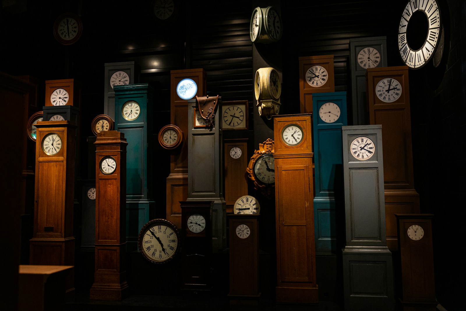 brown wooden door with analog clock